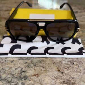 Black Marc Jacob’s Sunglasses with Gold Accents